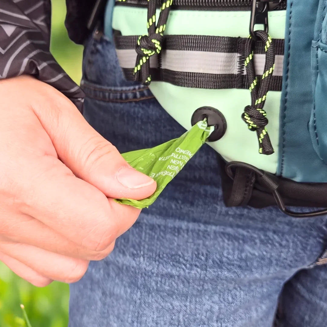 One-hand poop bag dispenser built into dog walking fanny pack side pocket