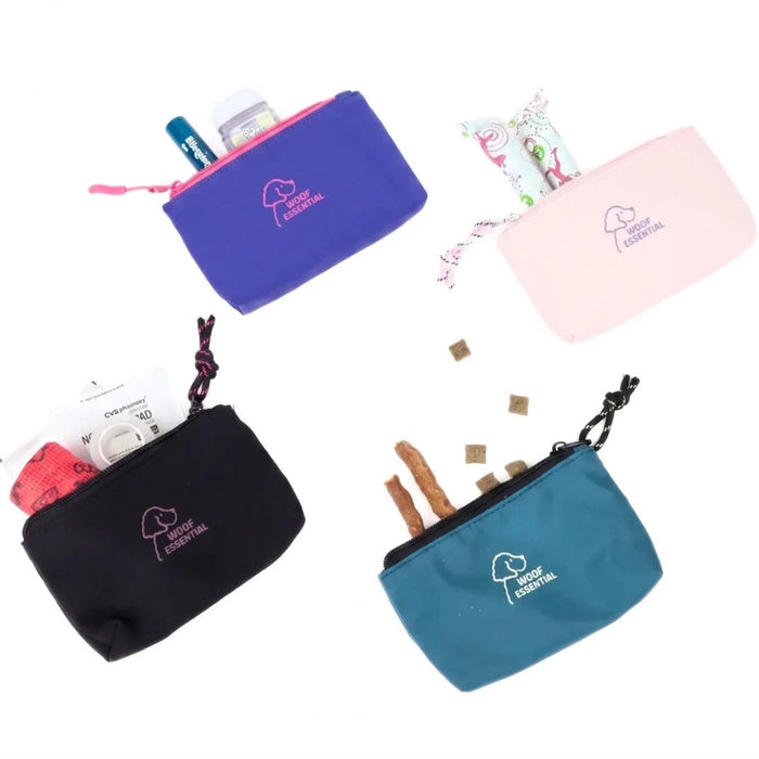 Removable multi-use pouches in four colors holding treats and small items