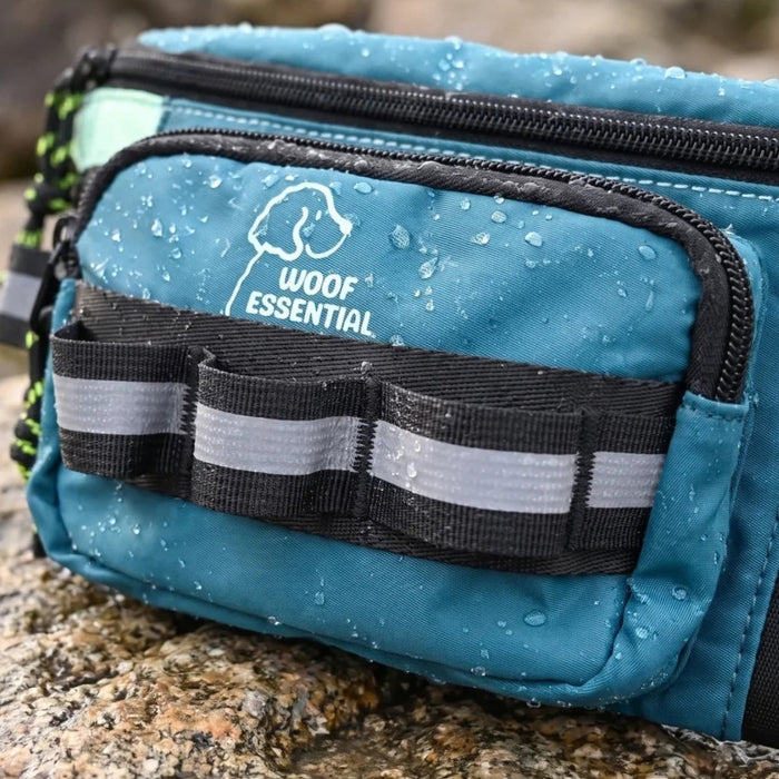 Water drops beading on the water-resistant nylon of the hip pack