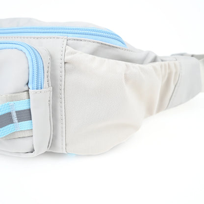 Stretch mesh side pocket on a grey dog walking bag